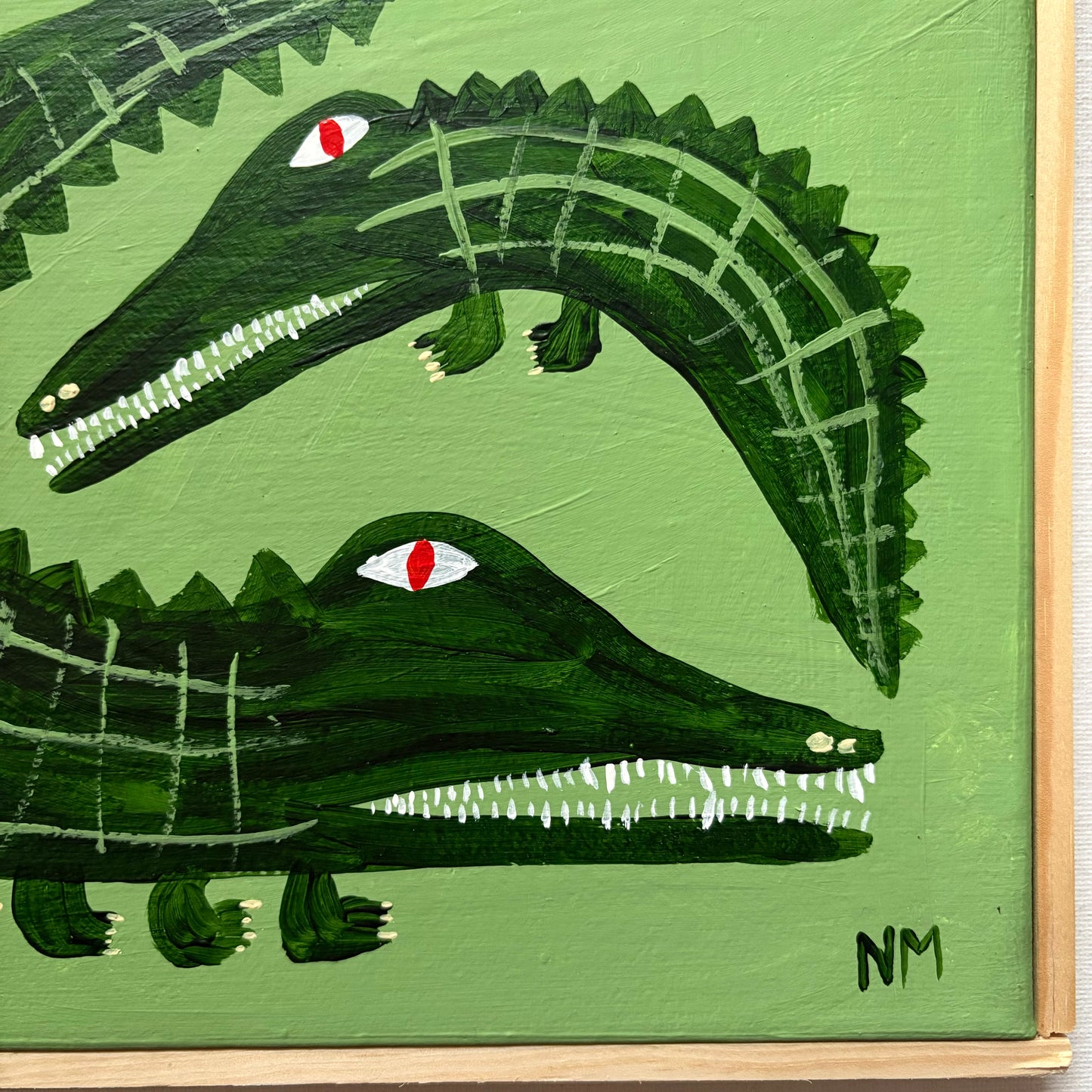 Crocodiles on green