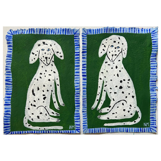 Two Dalmatians on green