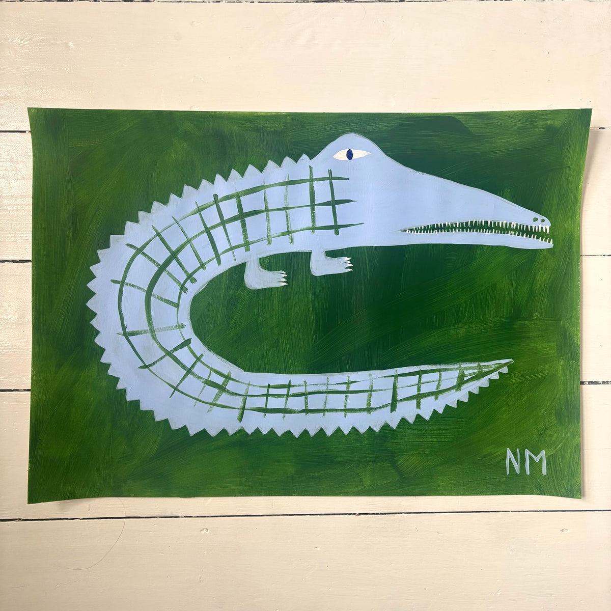 One blue crocodile.