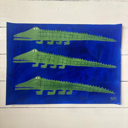 Three green crocodiles.