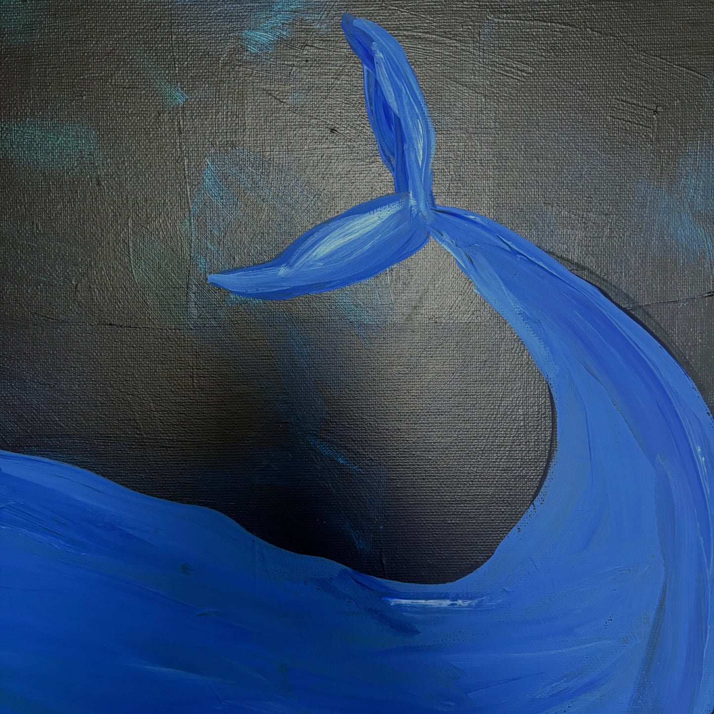 Whale in the deep blue sea.