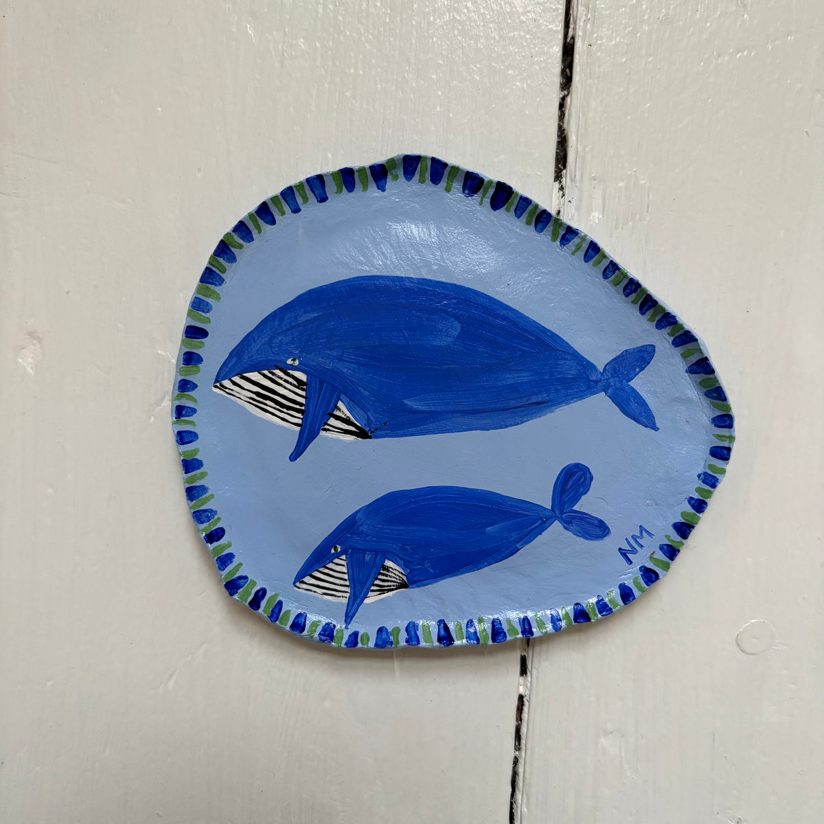 Baby whale wall hanging.