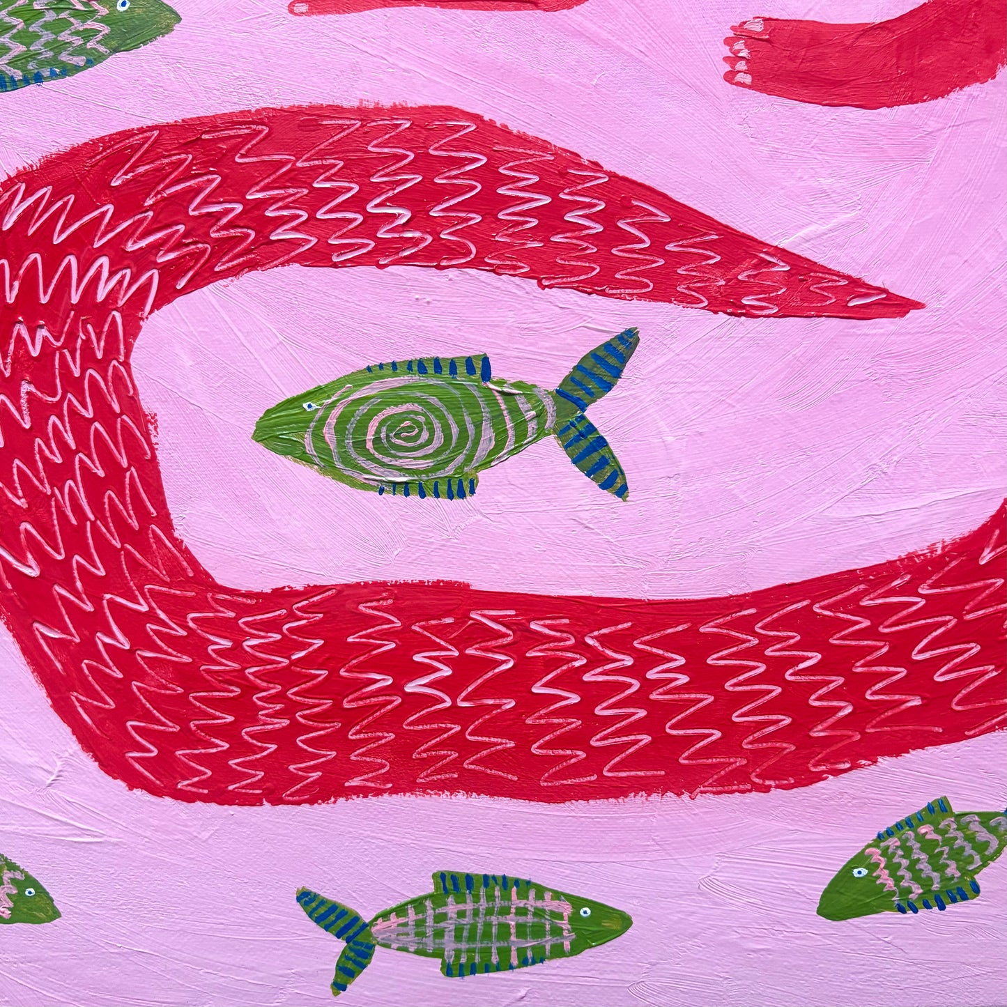 Red crocodile in the pink sea.