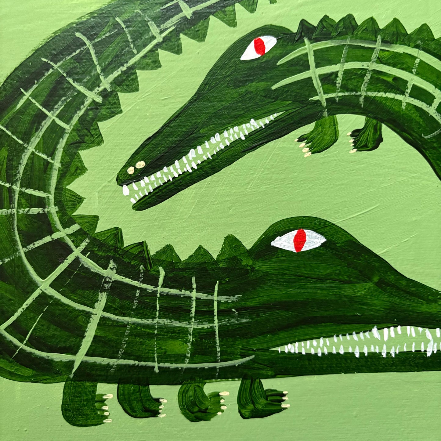 Crocodiles on green