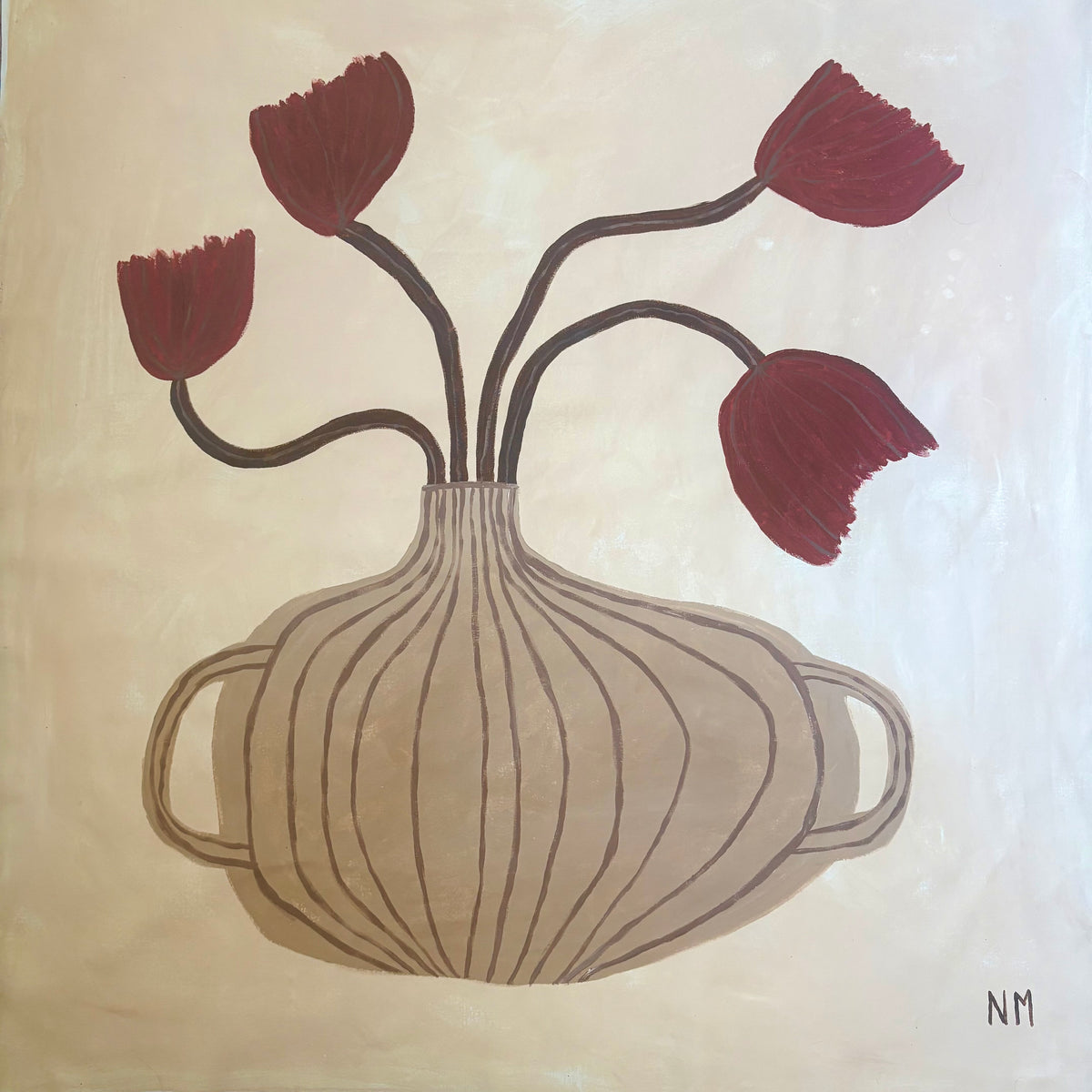 Red tulips in the vase.