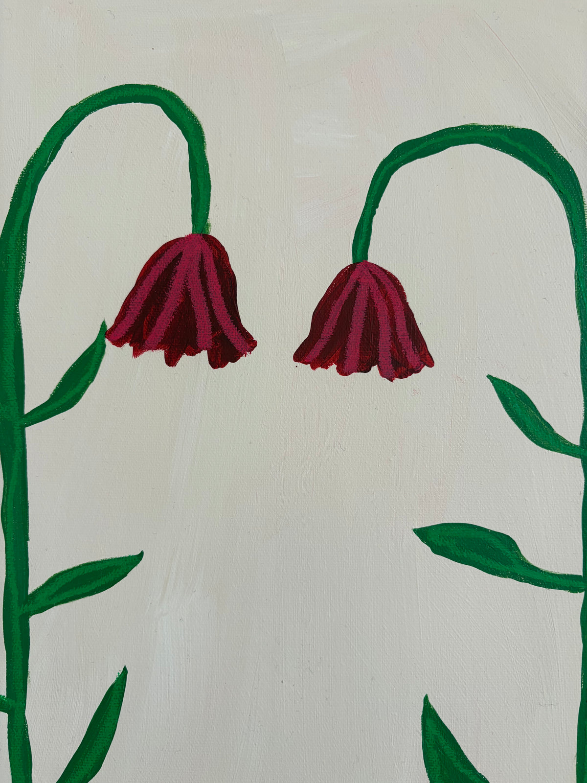 Two red flowers.
