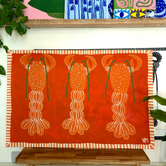 Three orange lobsters.