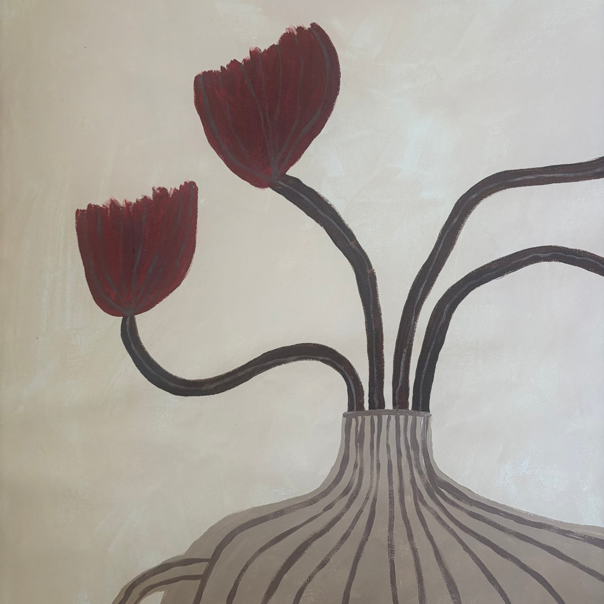 Red tulips in the vase.