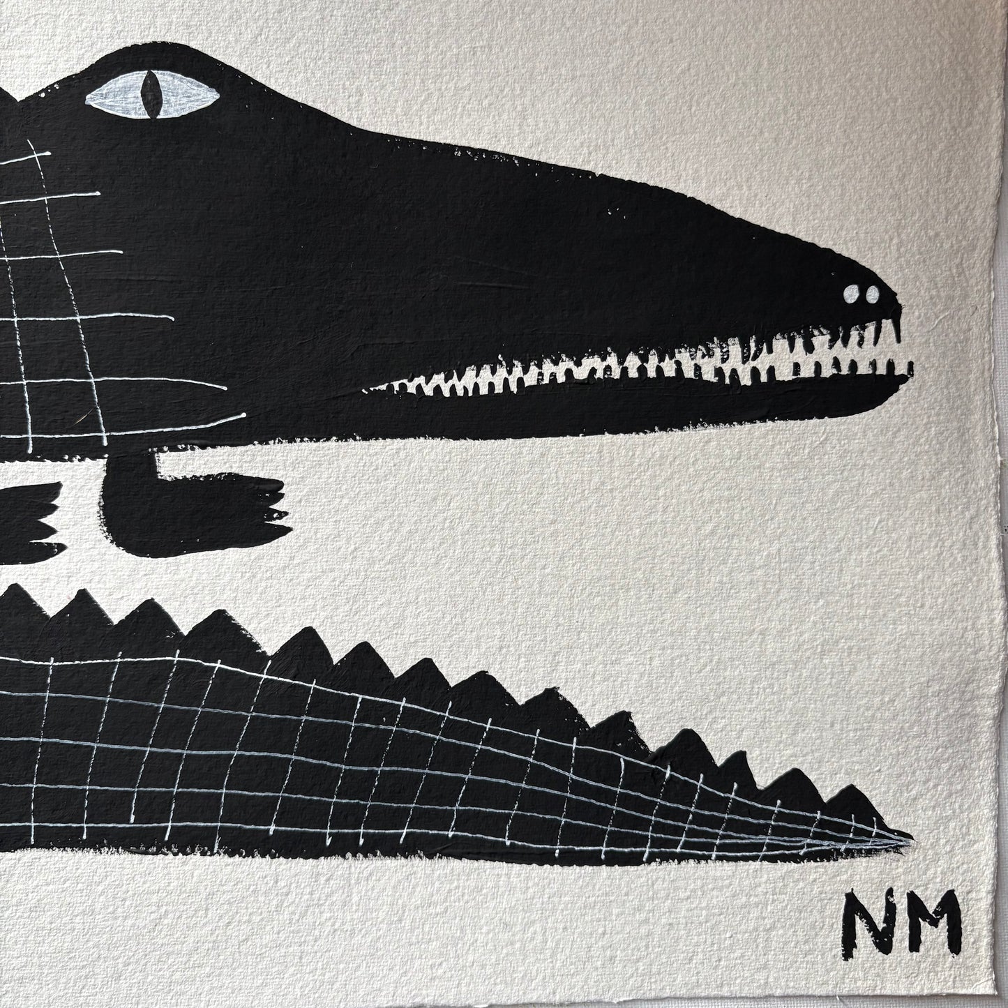 Three black crocodiles.