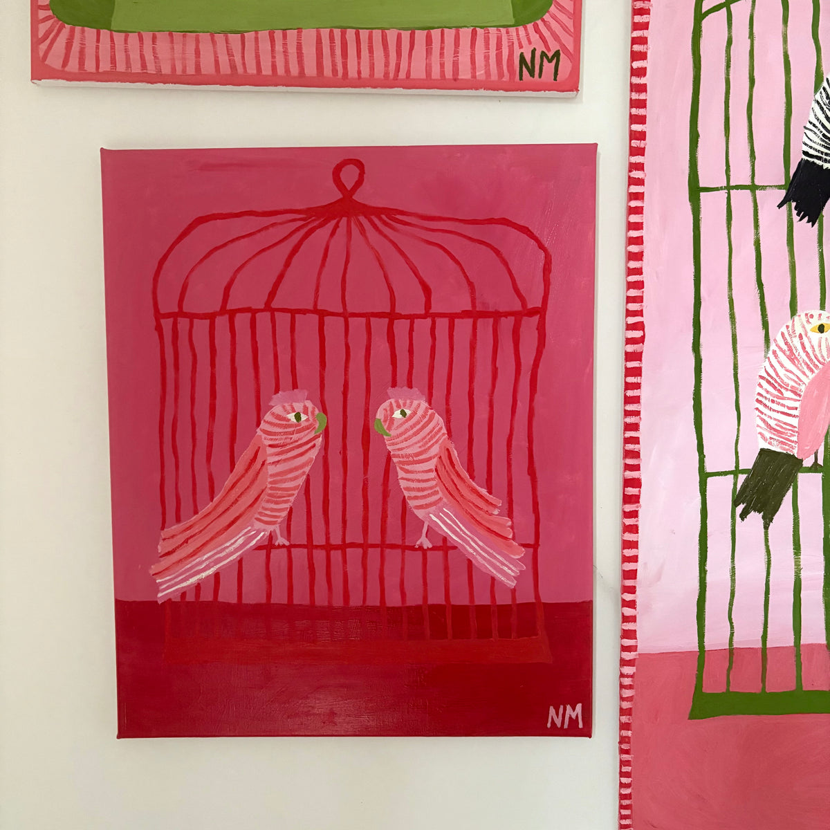 Two pink birds.
