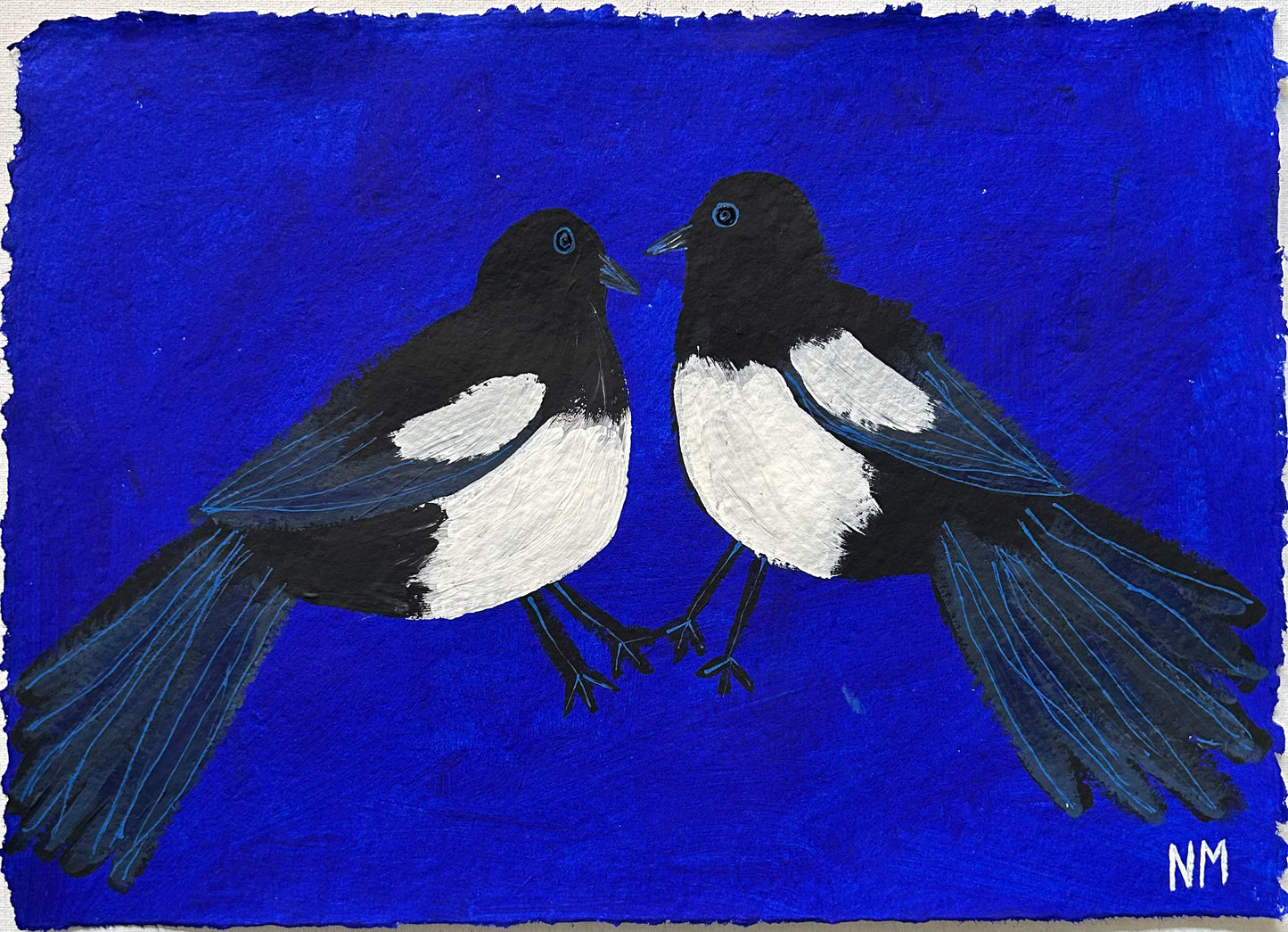 Magpies on blue