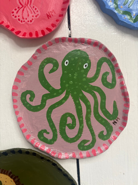 Green octopus wall plate.