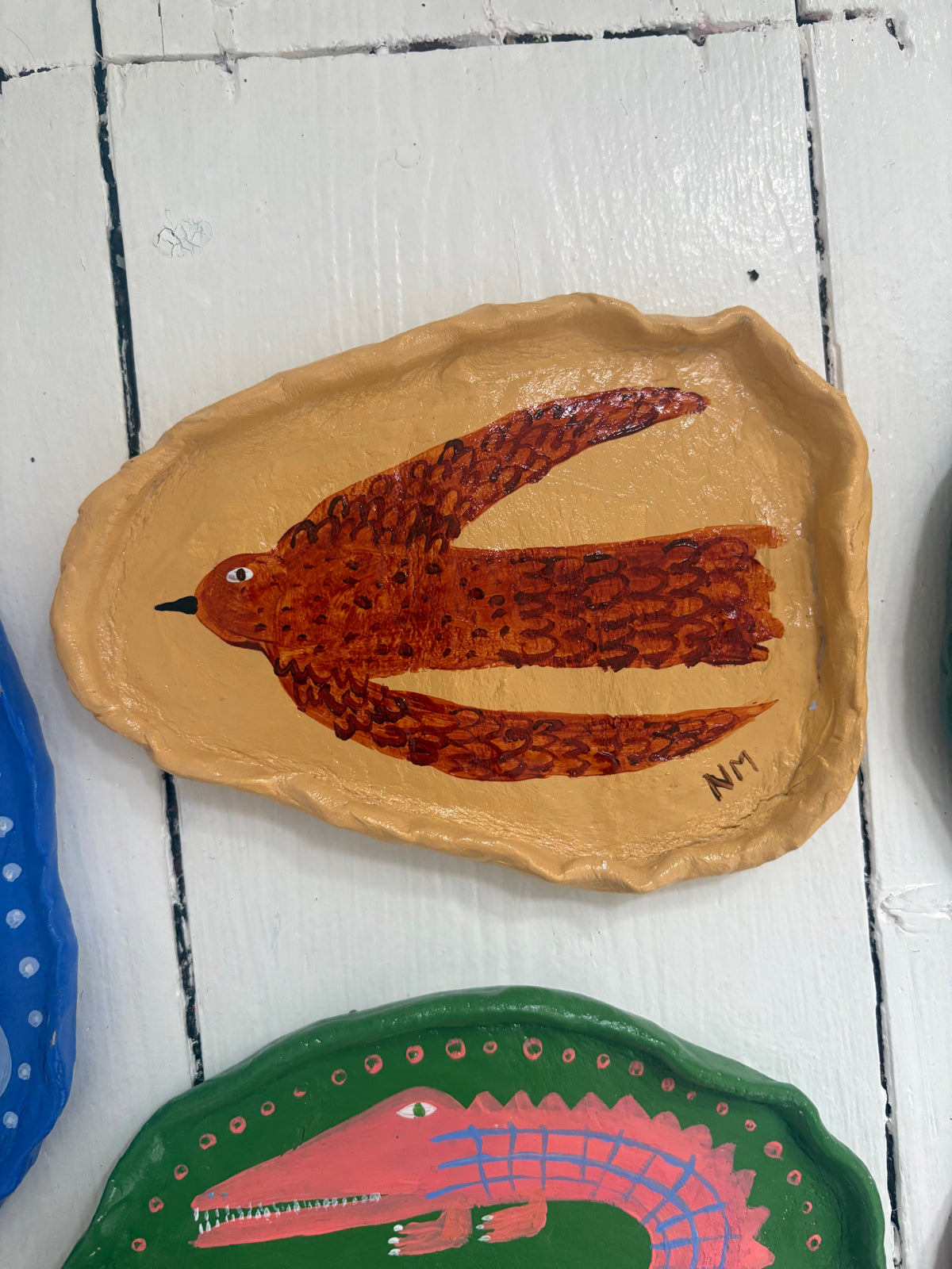 Brown bird wall plate.