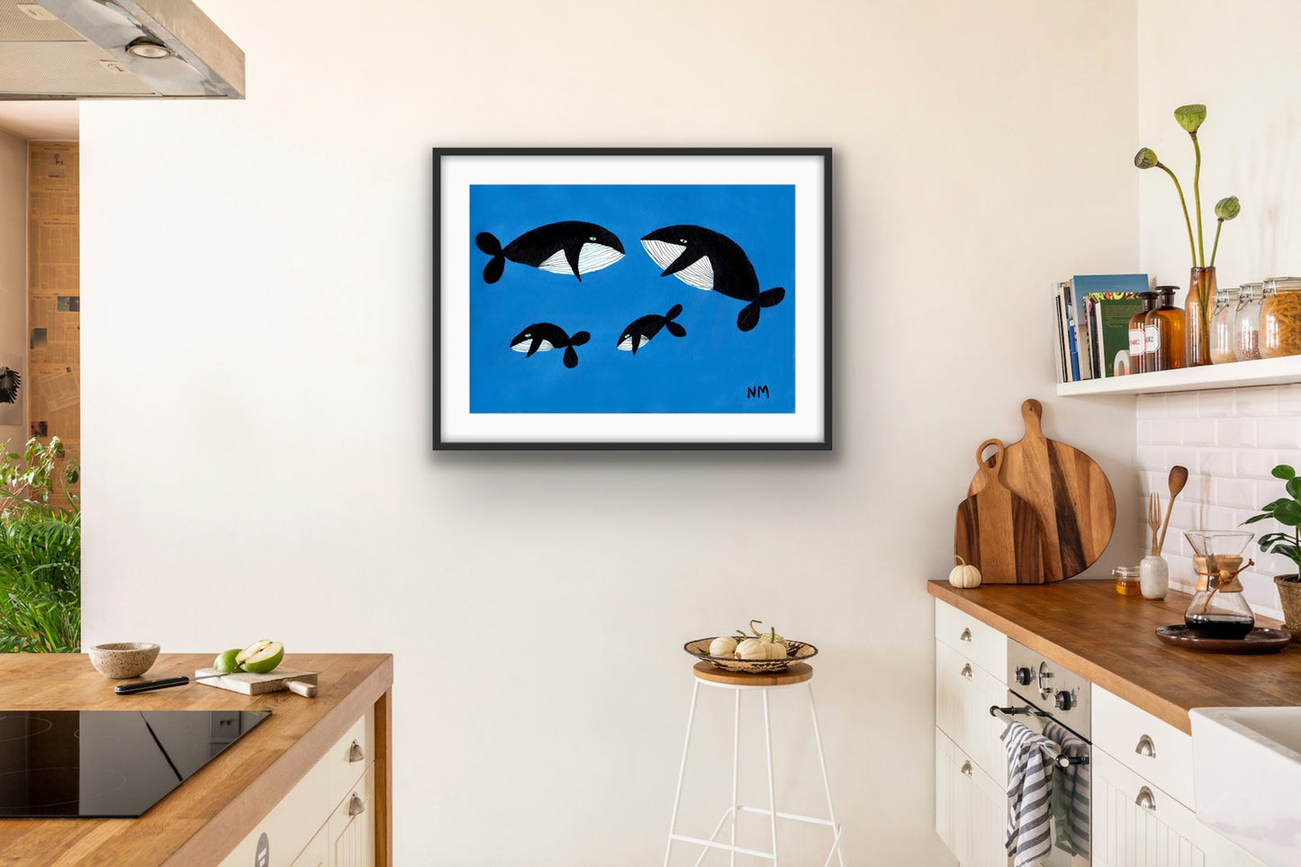 Whale family on blue print.