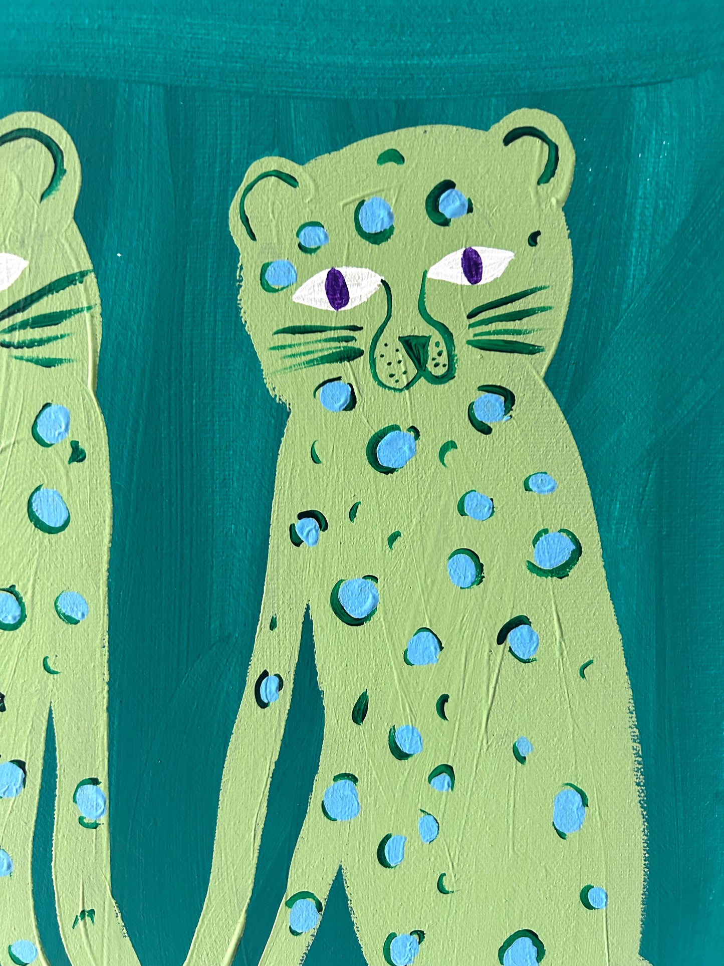 Leopard friends in green