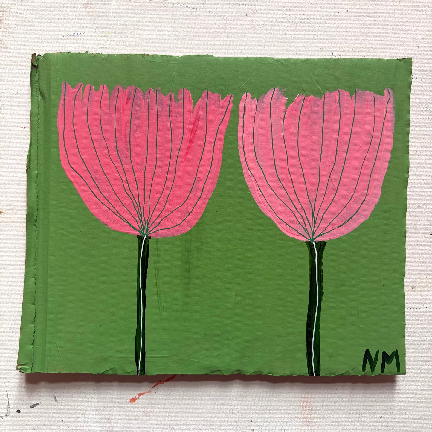 Two pink flowers.
