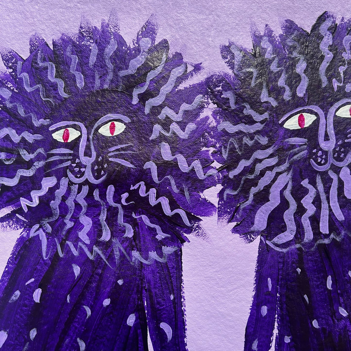 Two purple lions