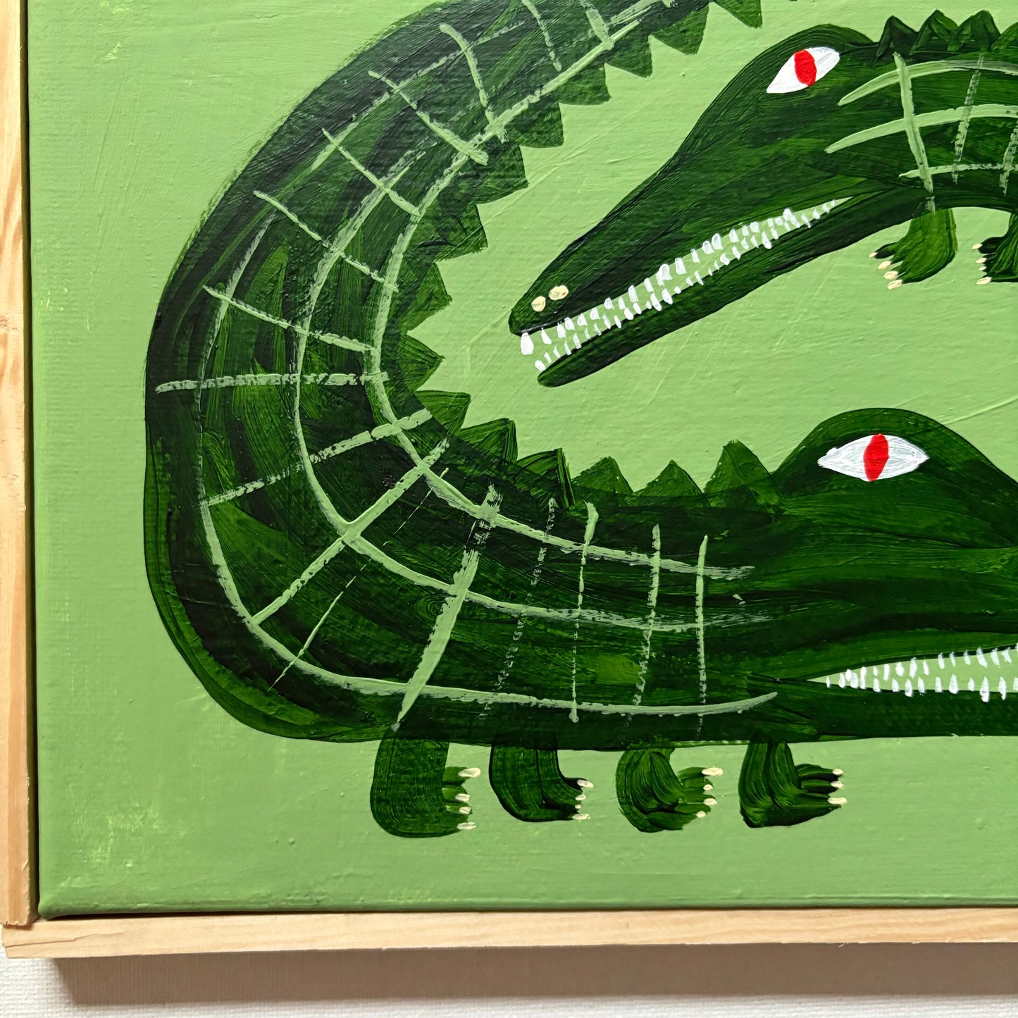 Crocodiles on green