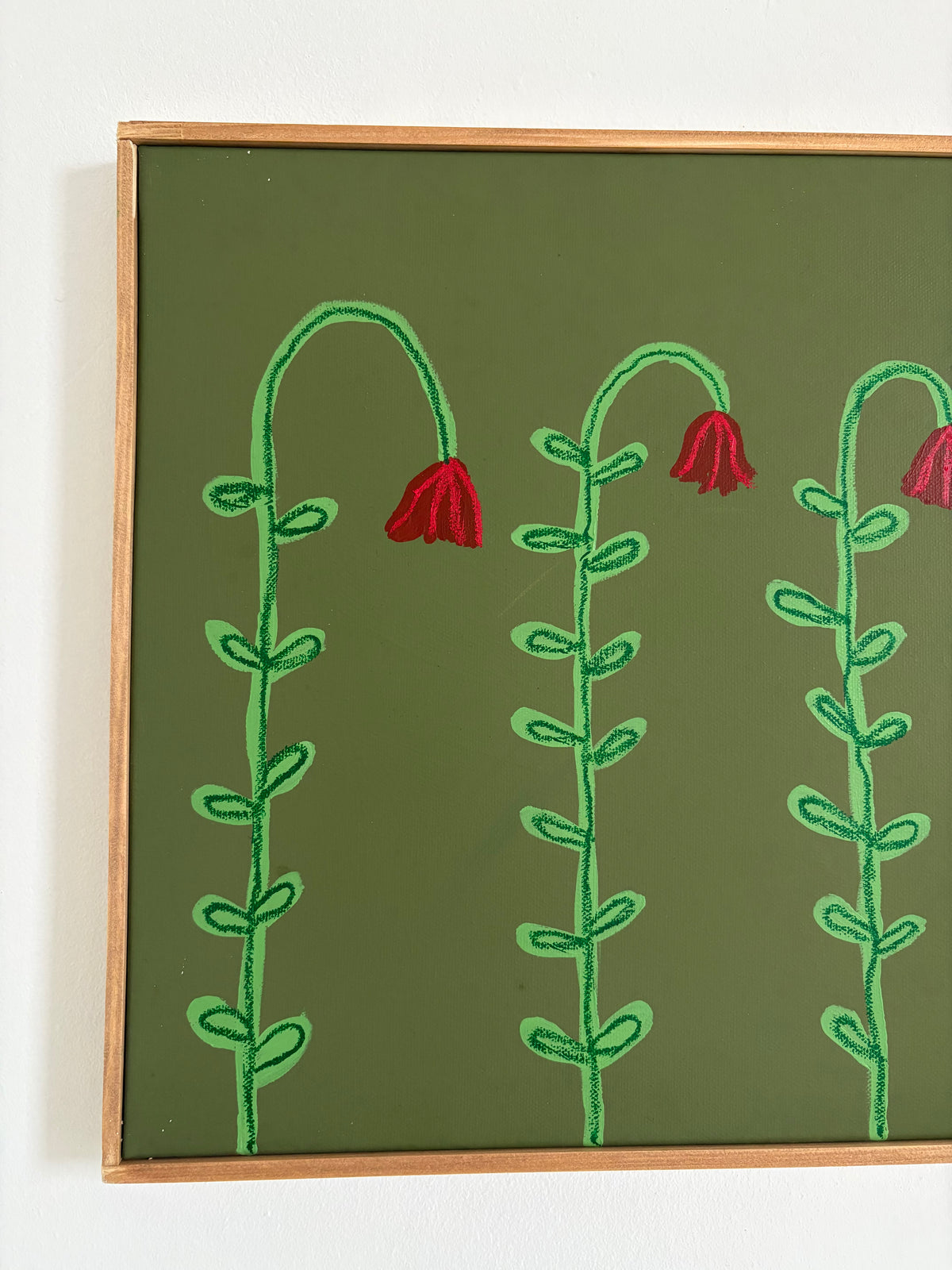 Four little red flowers.