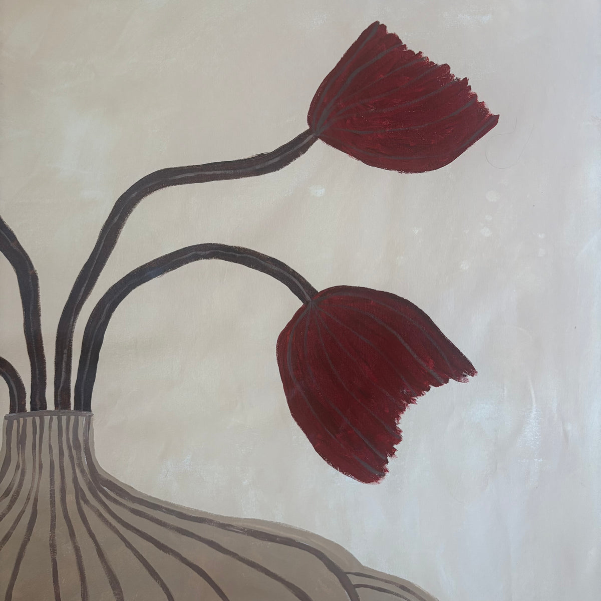 Red tulips in the vase.