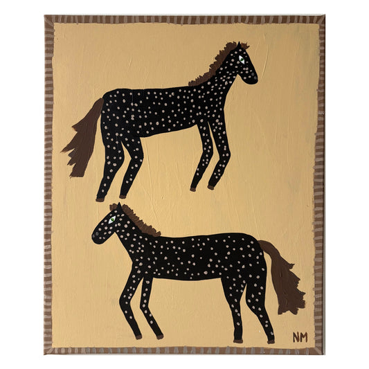 Two spotty horses.