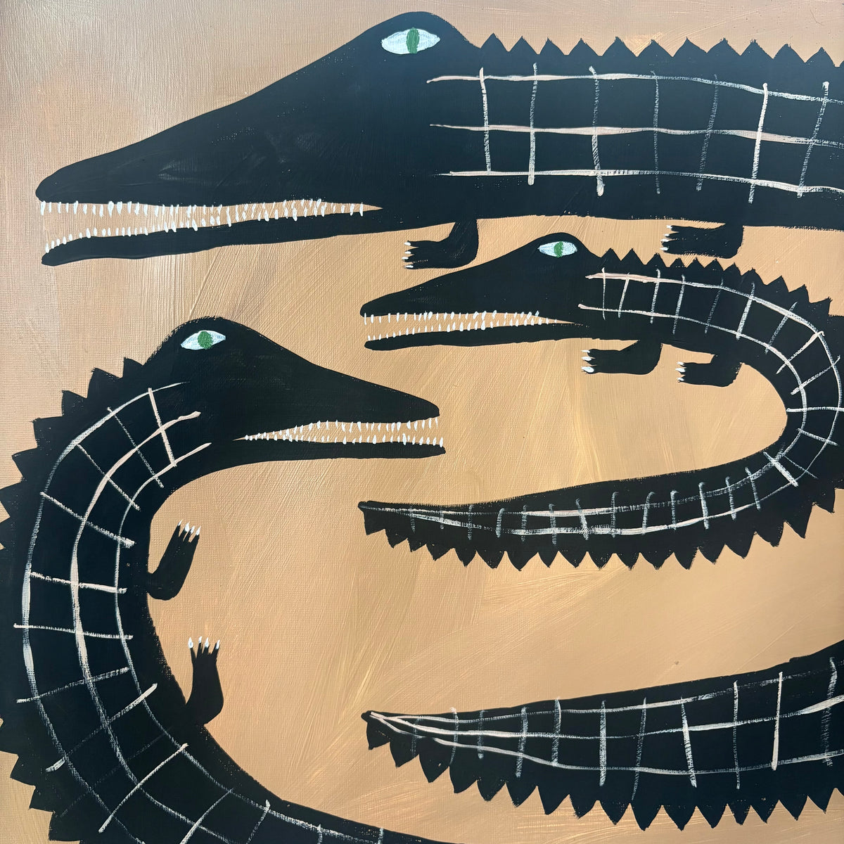 Three black crocodiles.