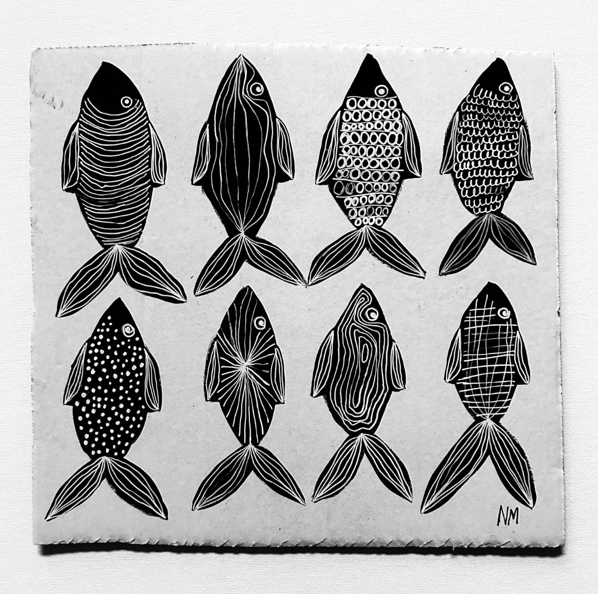 Eight black fish