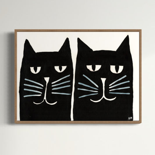 Two black cats